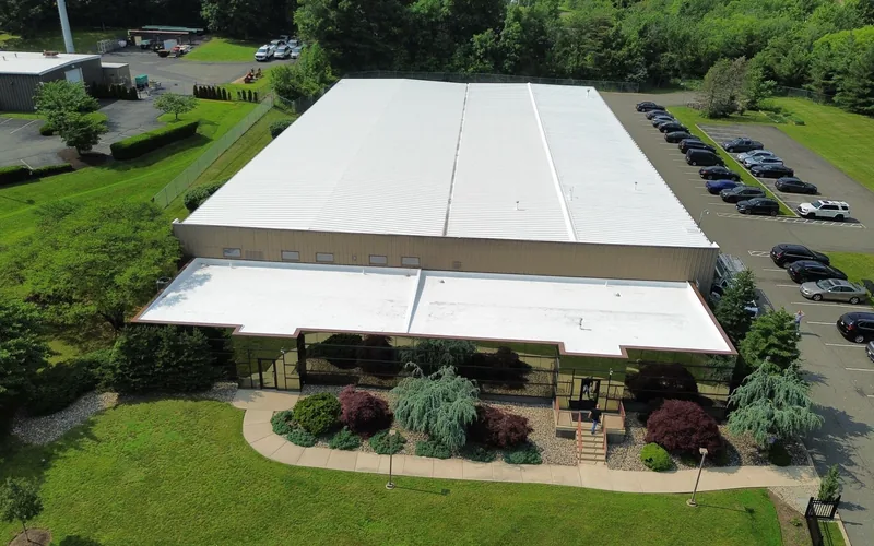 Completed commercial roof coating on a Berks County building