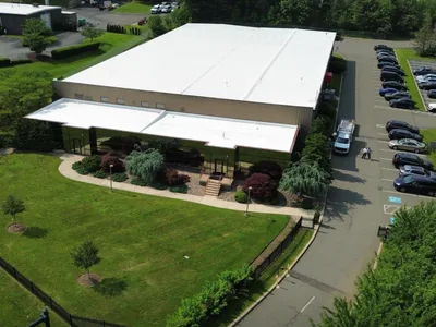 Commercial metal roof restoration on a Pennsylvania building