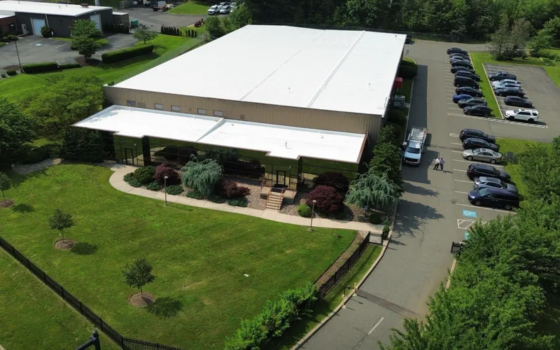 Commercial metal roof restoration on a Pennsylvania building